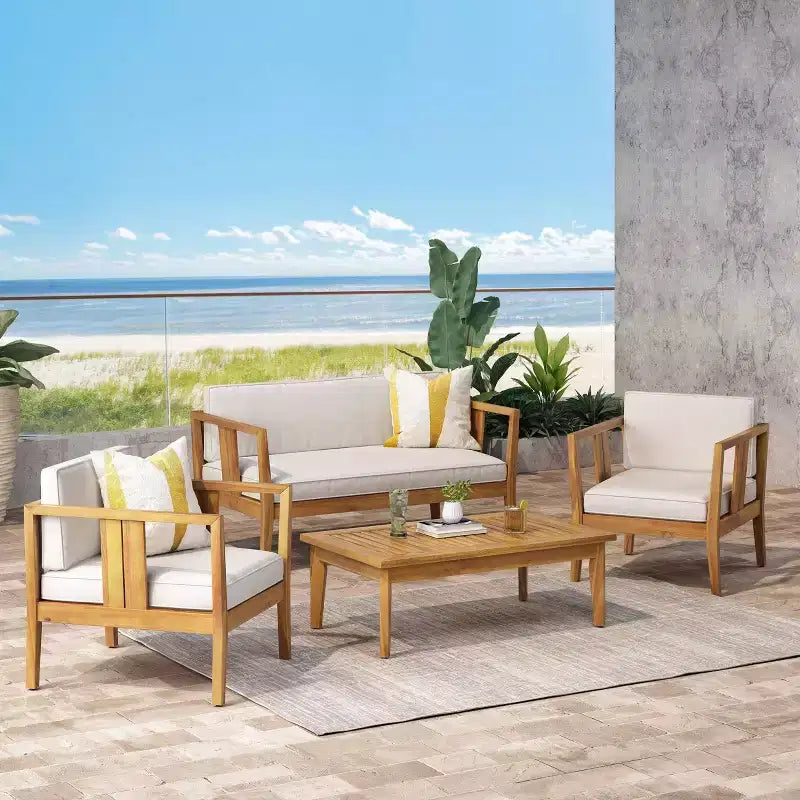 Set da Conversazione per Esterni 4 Posti Nicholson in Legno di Acacia - Teak/Beige - Christopher Knight Home: Set Conversazione per Patio con Cuscini e Tavolino da Caffè
