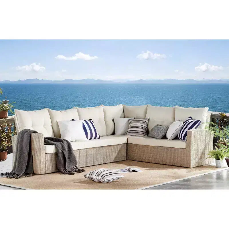 Ensemble de sièges d'angle sectionnels en osier d'extérieur 2 pièces crème Canaan – Meubles Alaterre : Résistant aux intempéries avec table basse