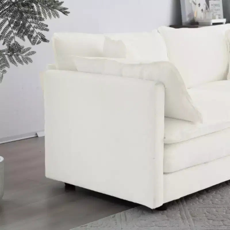 Divanetto in ciniglia con pouf e poggiapiedi: ideale per piccoli spazi