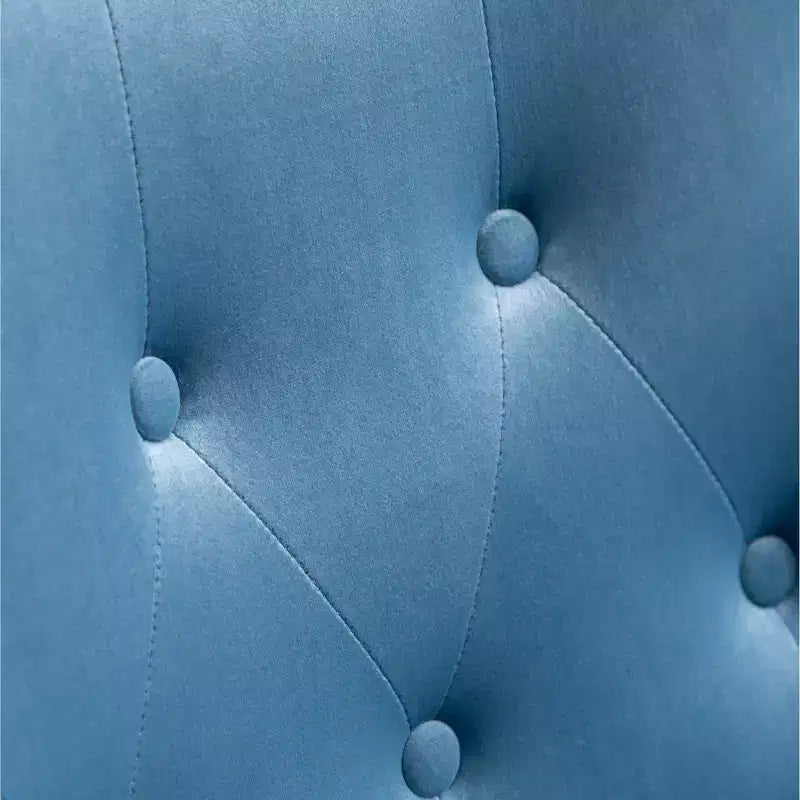 Poltrona Accent Doarnin contemporanea in velluto setoso con bottoni sullo schienale, blu