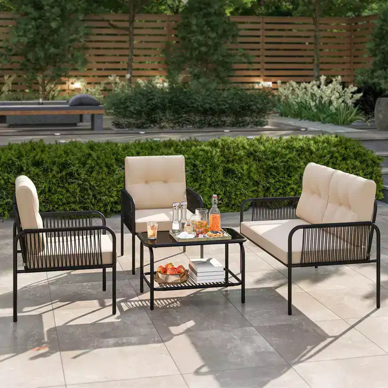 Set Mobili da Giardino 4 Pezzi Costway con Divanetto Tavolino da Caffè in Vetro Temperato e Cuscini Morbidi