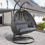 LeisureMod Sedia a Uovo Sospesa per 2 Persone con Supporto - Dondolo Pensile per Esterni/Interni in Rattan Intrecciato con Cuscini