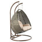 LeisureMod Sedia a Uovo Sospesa per 2 Persone con Supporto - Dondolo Pensile per Esterni/Interni in Rattan Intrecciato con Cuscini