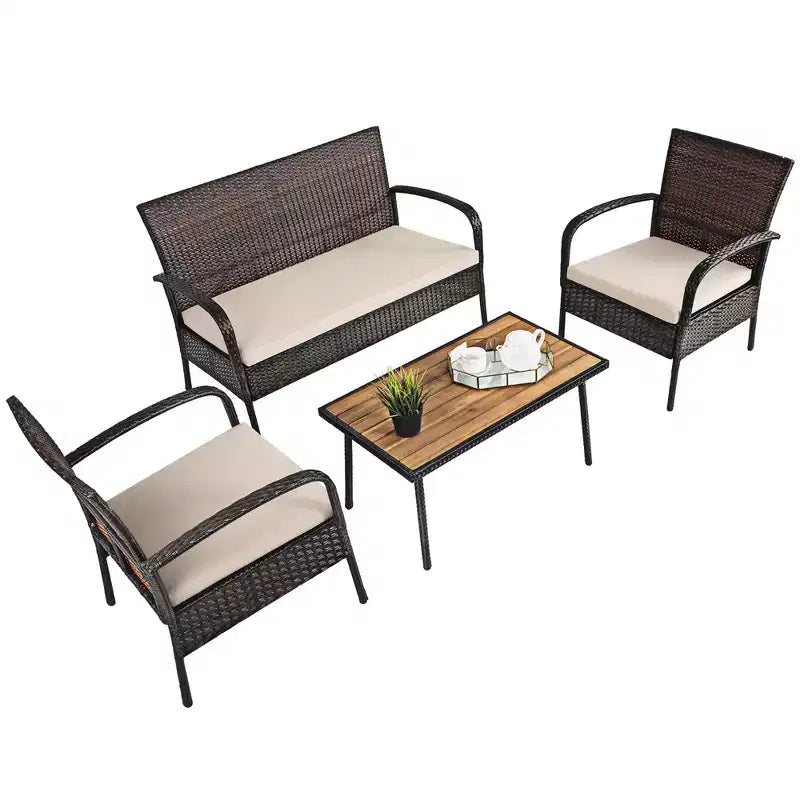 Set mobili da giardino in rattan Costway 4 pezzi, set da conversazione per esterni con tavolino da caffè e cuscini