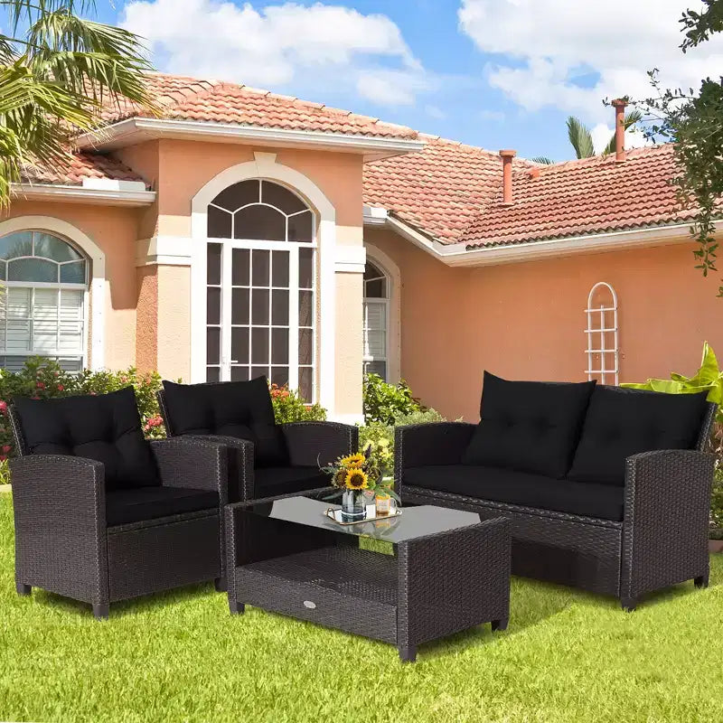 Costway Set Mobili da Giardino in Rattan 4 Pezzi Tavolo in Vetro Scaffale Divano Cuscino