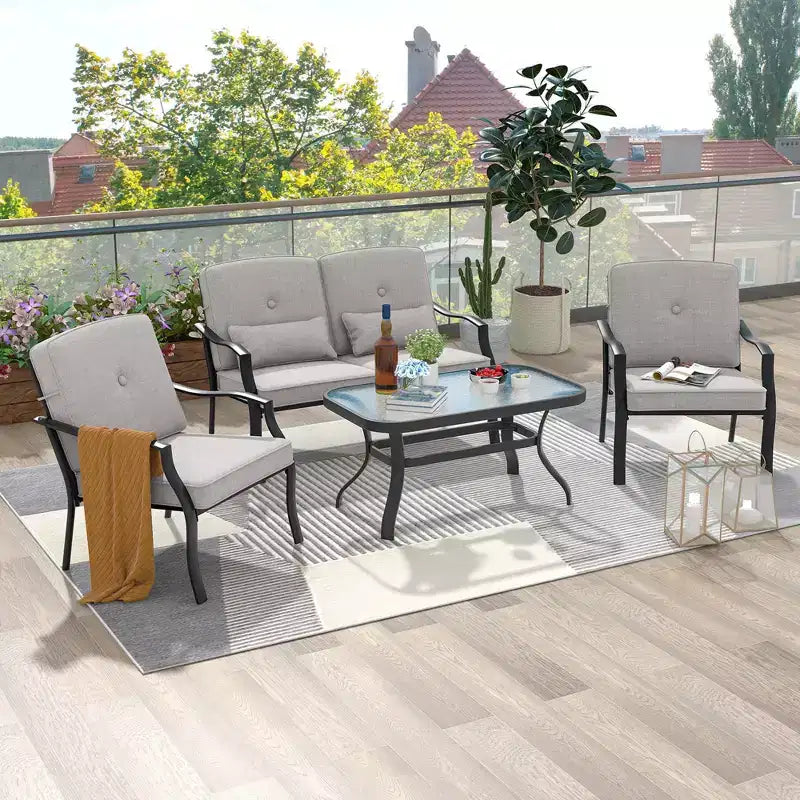 Set di mobili da giardino Costway 4 pezzi, divano da conversazione per esterni, tavolino da caffè in vetro temperato blu navy/grigio