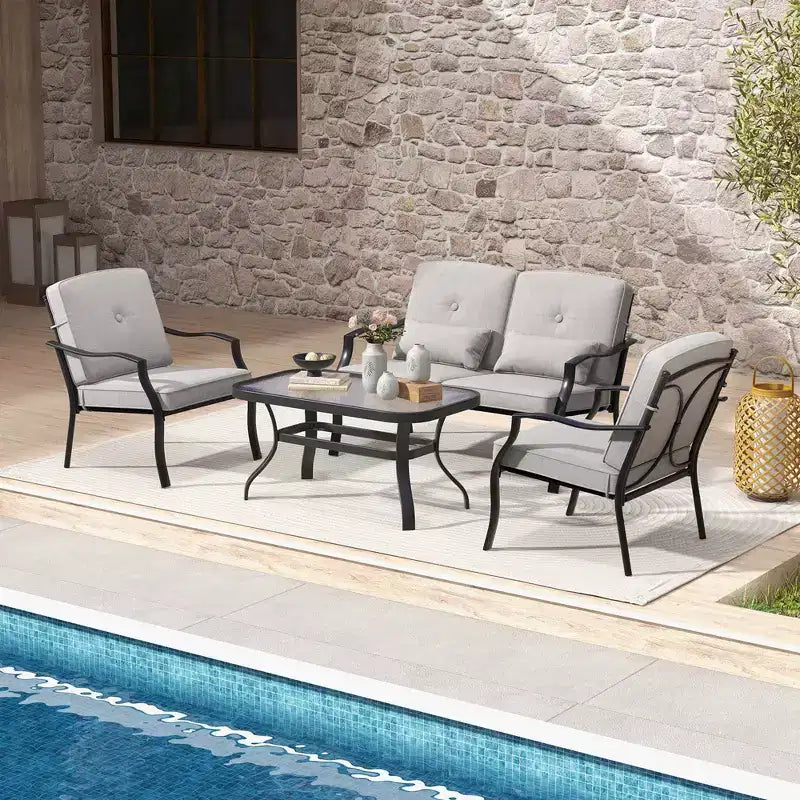Set di mobili da giardino Costway 4 pezzi, divano da conversazione per esterni, tavolino da caffè in vetro temperato blu navy/grigio