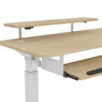 Bureau assis-debout en forme de L EUREKA ERGONOMIC 60x23 avec accessoires