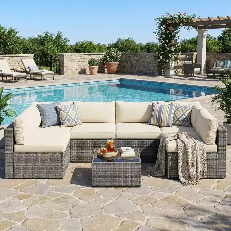 Salon de jardin 7 pièces en rotin, canapé modulaire d'extérieur avec coussins et table basse